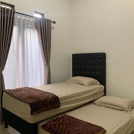 Guest House / Homestay Bukit Mutiara Residence Ngingas Экстерьер фото